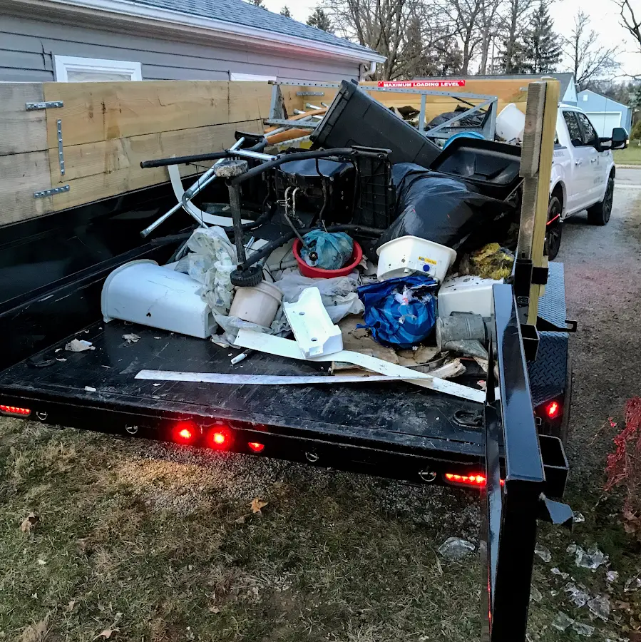 Roll-off dumpster delivered to a residential driveway in Saco